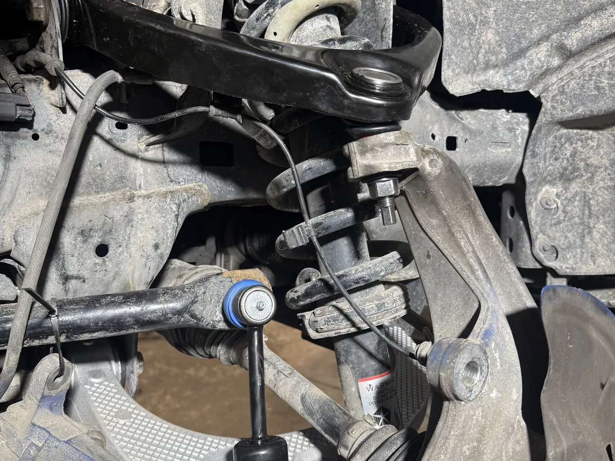 New front suspension components installed after repair