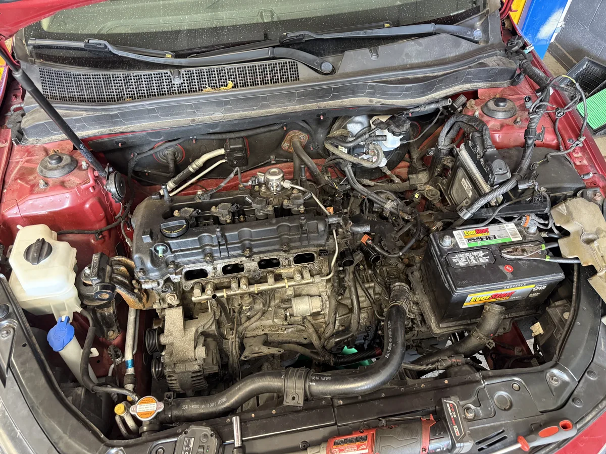 Engine bay with the replacement engine installed and connected